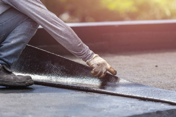 Professional Basement Waterproofing technician working in Newberry, MI